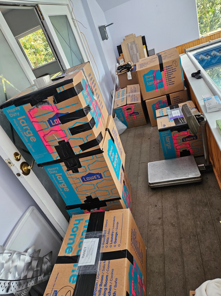 Staging the boxes as we pack op our lives